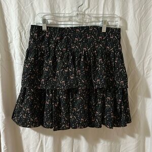 Floral print mini skirt. Fully lined, zipper in back. Never worn